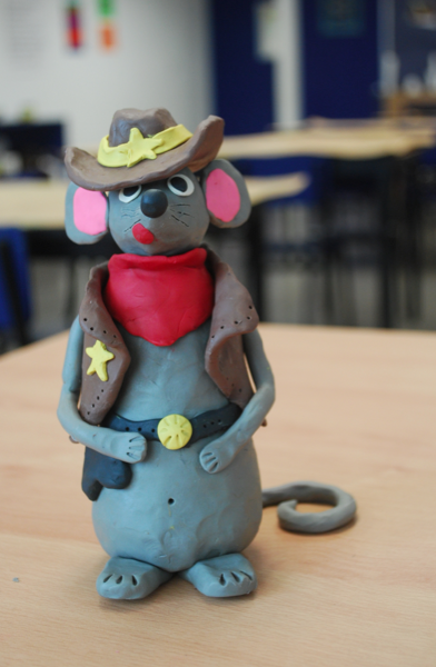 Modeling clay cowboy mouse character