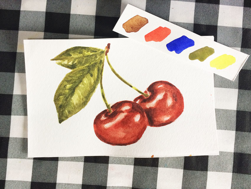 Watercolor illustration of cherries showing colors used.